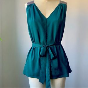 Great condition dark green blouse with silver mesh shoulders.